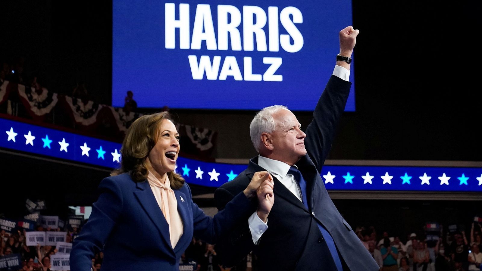 Kamala Harris y Tim Walz en un mitin político