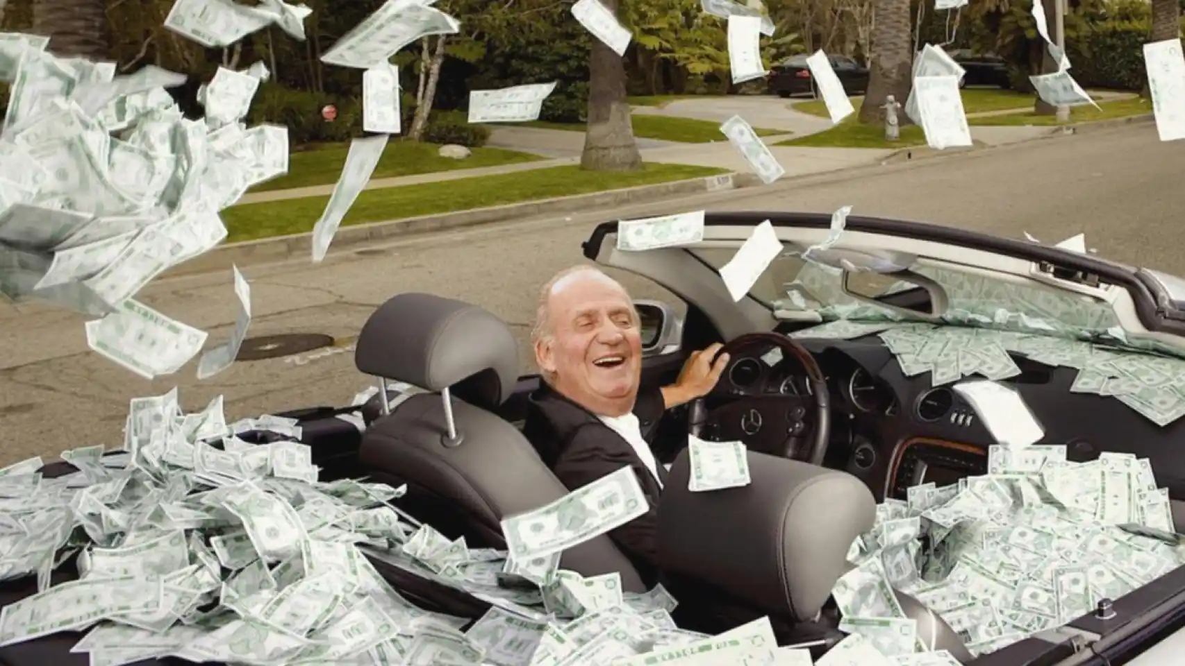 Edit del rey Juan Carlos en un coche